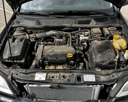 Черный Опель Астра, объемом двигателя 1.4 л и пробегом 277 тыс. км за 3300 $, фото 20 на Automoto.ua