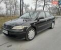 Черный Опель Астра, объемом двигателя 1.6 л и пробегом 198 тыс. км за 4100 $, фото 1 на Automoto.ua