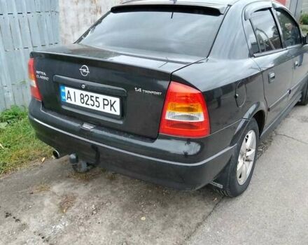 Черный Опель Астра, объемом двигателя 1.39 л и пробегом 166 тыс. км за 4600 $, фото 5 на Automoto.ua