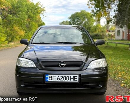 Черный Опель Астра, объемом двигателя 1.4 л и пробегом 250 тыс. км за 4000 $, фото 1 на Automoto.ua