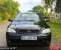 Черный Опель Астра, объемом двигателя 1.4 л и пробегом 250 тыс. км за 4000 $, фото 1 на Automoto.ua