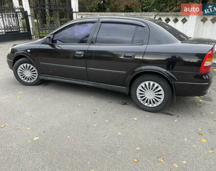 Черный Опель Астра, объемом двигателя 1.6 л и пробегом 150 тыс. км за 3800 $, фото 5 на Automoto.ua