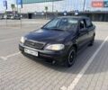 Черный Опель Астра, объемом двигателя 1.4 л и пробегом 179 тыс. км за 3250 $, фото 1 на Automoto.ua