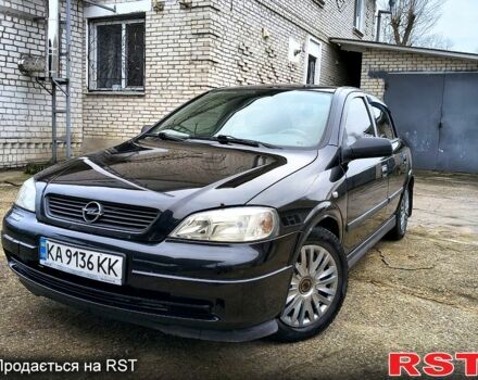 Черный Опель Астра, объемом двигателя 1.4 л и пробегом 250 тыс. км за 3999 $, фото 1 на Automoto.ua