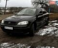 Черный Опель Астра, объемом двигателя 1.36 л и пробегом 207 тыс. км за 3100 $, фото 1 на Automoto.ua