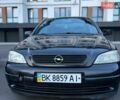 Черный Опель Астра, объемом двигателя 1.6 л и пробегом 245 тыс. км за 3600 $, фото 1 на Automoto.ua