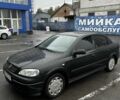 Чорний Опель Астра, об'ємом двигуна 1.6 л та пробігом 245 тис. км за 3986 $, фото 1 на Automoto.ua