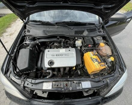 Черный Опель Астра, объемом двигателя 1.6 л и пробегом 280 тыс. км за 1906 $, фото 7 на Automoto.ua