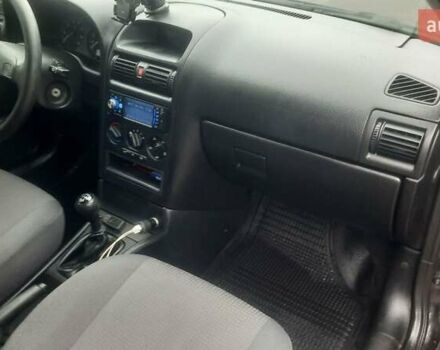 Черный Опель Астра, объемом двигателя 1.6 л и пробегом 277 тыс. км за 3400 $, фото 9 на Automoto.ua