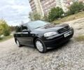 Черный Опель Астра, объемом двигателя 1.4 л и пробегом 176 тыс. км за 4390 $, фото 1 на Automoto.ua