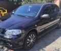 Черный Опель Астра, объемом двигателя 1.39 л и пробегом 143 тыс. км за 4200 $, фото 1 на Automoto.ua