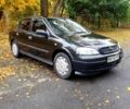 Черный Опель Астра, объемом двигателя 1.4 л и пробегом 265 тыс. км за 3150 $, фото 1 на Automoto.ua