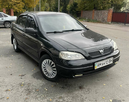 Черный Опель Астра, объемом двигателя 1.6 л и пробегом 150 тыс. км за 3800 $, фото 1 на Automoto.ua