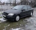 Черный Опель Астра, объемом двигателя 1.39 л и пробегом 165 тыс. км за 3500 $, фото 1 на Automoto.ua