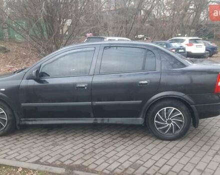 Черный Опель Астра, объемом двигателя 1.6 л и пробегом 277 тыс. км за 3400 $, фото 5 на Automoto.ua