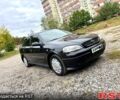 Черный Опель Астра, объемом двигателя 1.4 л и пробегом 176 тыс. км за 4390 $, фото 1 на Automoto.ua