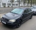Черный Опель Астра, объемом двигателя 1.4 л и пробегом 230 тыс. км за 3347 $, фото 1 на Automoto.ua