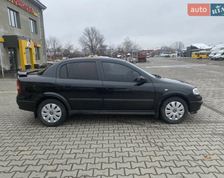 Черный Опель Астра, объемом двигателя 1.4 л и пробегом 229 тыс. км за 3200 $, фото 3 на Automoto.ua