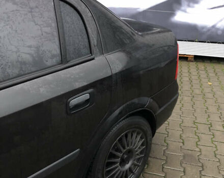 Черный Опель Астра, объемом двигателя 1.36 л и пробегом 292 тыс. км за 2700 $, фото 4 на Automoto.ua