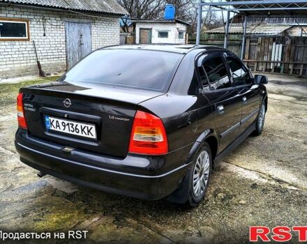 Черный Опель Астра, объемом двигателя 1.4 л и пробегом 250 тыс. км за 3999 $, фото 3 на Automoto.ua