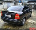 Черный Опель Астра, объемом двигателя 1.4 л и пробегом 250 тыс. км за 3999 $, фото 3 на Automoto.ua