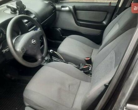 Черный Опель Астра, объемом двигателя 1.6 л и пробегом 277 тыс. км за 3400 $, фото 7 на Automoto.ua