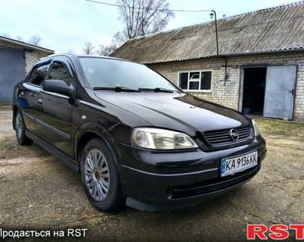 Черный Опель Астра, объемом двигателя 1.4 л и пробегом 250 тыс. км за 3999 $, фото 2 на Automoto.ua