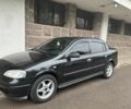 Черный Опель Астра, объемом двигателя 1.6 л и пробегом 240 тыс. км за 4500 $, фото 1 на Automoto.ua