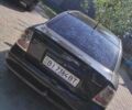 Черный Опель Астра, объемом двигателя 1.39 л и пробегом 143 тыс. км за 4200 $, фото 2 на Automoto.ua