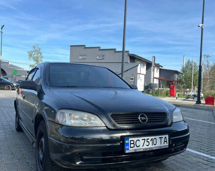 Черный Опель Астра, объемом двигателя 1.4 л и пробегом 290 тыс. км за 2700 $, фото 2 на Automoto.ua