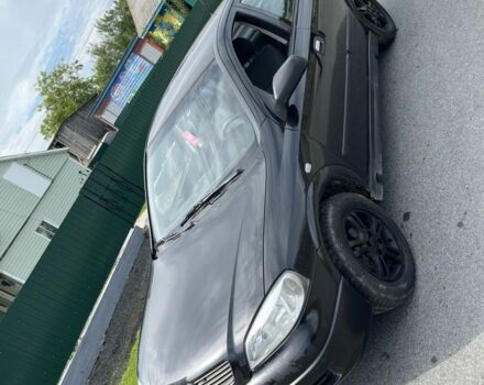 Черный Опель Астра, объемом двигателя 1.6 л и пробегом 280 тыс. км за 1906 $, фото 4 на Automoto.ua