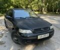 Чорний Опель Астра, об'ємом двигуна 1.6 л та пробігом 255 тис. км за 2000 $, фото 1 на Automoto.ua