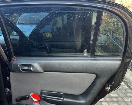 Черный Опель Астра, объемом двигателя 1.6 л и пробегом 151 тыс. км за 3700 $, фото 12 на Automoto.ua