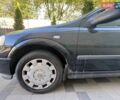 Черный Опель Астра, объемом двигателя 1.39 л и пробегом 142 тыс. км за 3500 $, фото 1 на Automoto.ua
