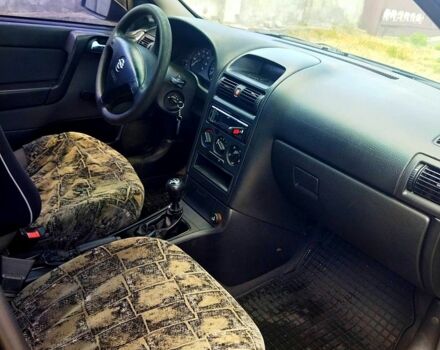 Черный Опель Астра, объемом двигателя 1.4 л и пробегом 141 тыс. км за 4000 $, фото 5 на Automoto.ua