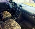 Черный Опель Астра, объемом двигателя 1.4 л и пробегом 141 тыс. км за 4000 $, фото 5 на Automoto.ua