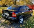 Черный Опель Астра, объемом двигателя 1.4 л и пробегом 168 тыс. км за 2450 $, фото 6 на Automoto.ua