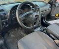 Черный Опель Астра, объемом двигателя 1.6 л и пробегом 198 тыс. км за 3800 $, фото 4 на Automoto.ua