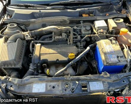 Черный Опель Астра, объемом двигателя 1.4 л и пробегом 200 тыс. км за 3350 $, фото 1 на Automoto.ua