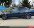Черный Опель Астра, объемом двигателя 1.4 л и пробегом 200 тыс. км за 2700 $, фото 1 на Automoto.ua