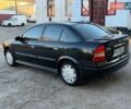 Черный Опель Астра, объемом двигателя 1.4 л и пробегом 200 тыс. км за 1550 $, фото 1 на Automoto.ua