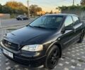 Черный Опель Астра, объемом двигателя 1.6 л и пробегом 198 тыс. км за 3800 $, фото 2 на Automoto.ua