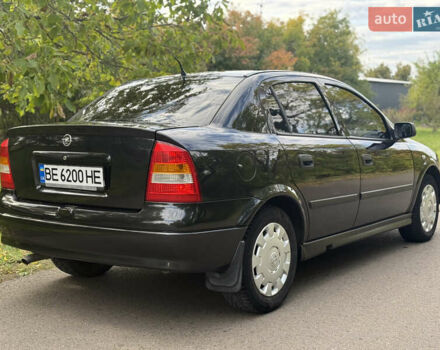 Черный Опель Астра, объемом двигателя 1.4 л и пробегом 250 тыс. км за 3650 $, фото 3 на Automoto.ua