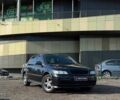Черный Опель Астра, объемом двигателя 2 л и пробегом 260 тыс. км за 3790 $, фото 1 на Automoto.ua