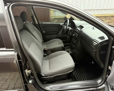 Черный Опель Астра, объемом двигателя 1.4 л и пробегом 160 тыс. км за 4000 $, фото 14 на Automoto.ua