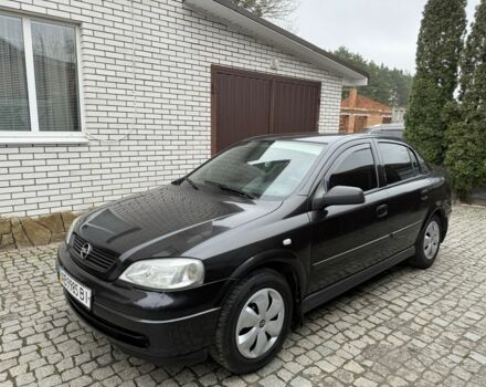 Черный Опель Астра, объемом двигателя 1.4 л и пробегом 160 тыс. км за 4000 $, фото 2 на Automoto.ua