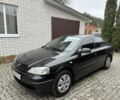 Черный Опель Астра, объемом двигателя 1.4 л и пробегом 160 тыс. км за 4000 $, фото 2 на Automoto.ua