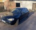 Черный Опель Астра, объемом двигателя 1.4 л и пробегом 219 тыс. км за 3400 $, фото 1 на Automoto.ua