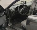 Черный Опель Астра, объемом двигателя 1.6 л и пробегом 315 тыс. км за 3200 $, фото 1 на Automoto.ua