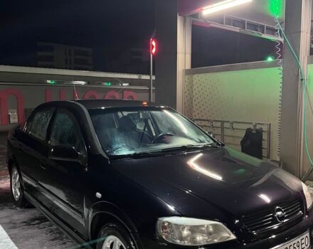 Черный Опель Астра, объемом двигателя 1.4 л и пробегом 338 тыс. км за 2300 $, фото 2 на Automoto.ua
